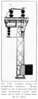 Fig. 9.18. Auxiliary devices for  ground-fault neutralizer. By-pass switch on top of horizontal platform, series disconnecting switch underneath, and at right of column housing for relays.