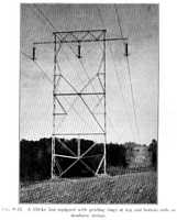 Fig. 9.33. A 110-kv line equipped with grading rings at top and bottom ends of insulator strings.