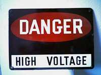 Black 'Danger - High Voltage' Sign - front view