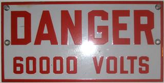 DANGER
60000 VOLTS

Enameled metal.
