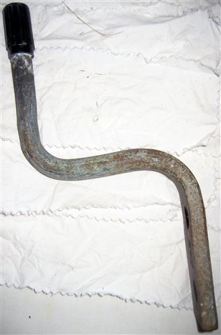 Plastic cob at end of S shaped piece.